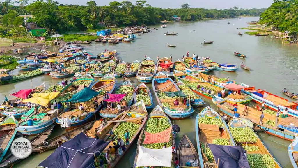 Experience the bustling energy of a traditional floating market in Barisal