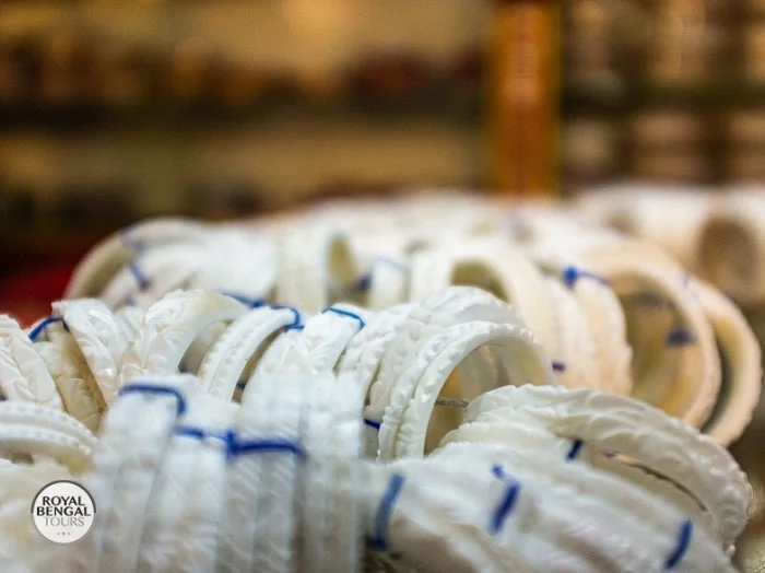 Conch shell bangles made by Hindu artisans at Shakhari Bazar, Old Dhaka, Bangladesh
