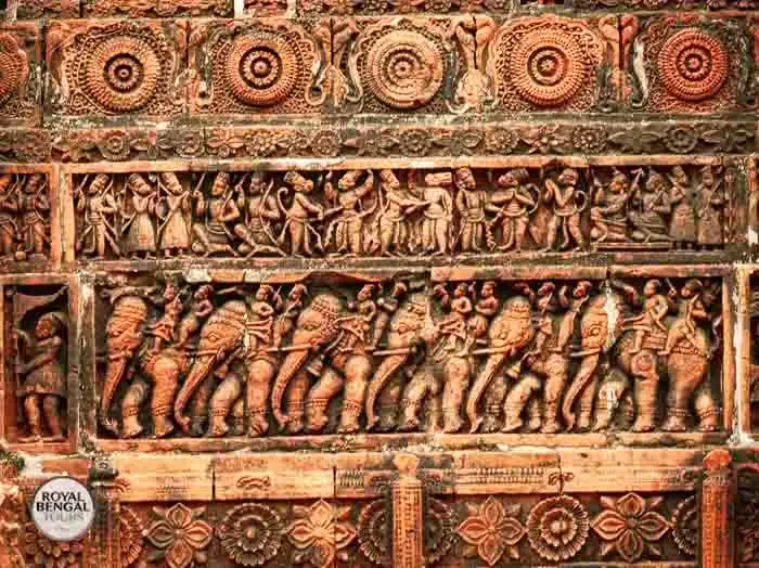 Terracotta facade of Kantaji Temple depicting scenes from Hindu mythology