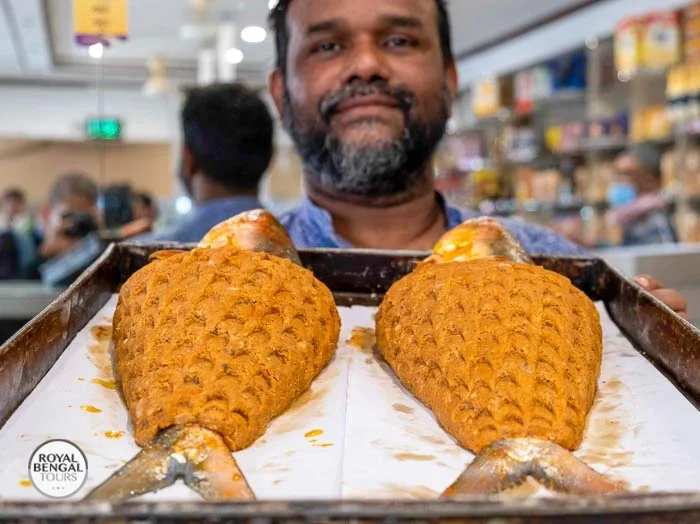 Fish kabab preparation in Old Dhaka, Skewered and marinated fish being cooked on a barbecue grill