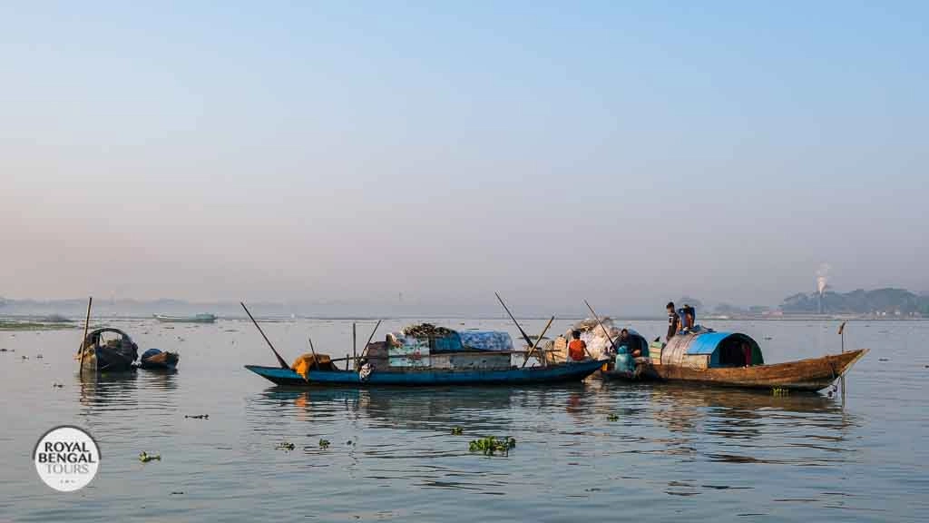 Traditional houseboats on the serene rivers of Barisal backwater