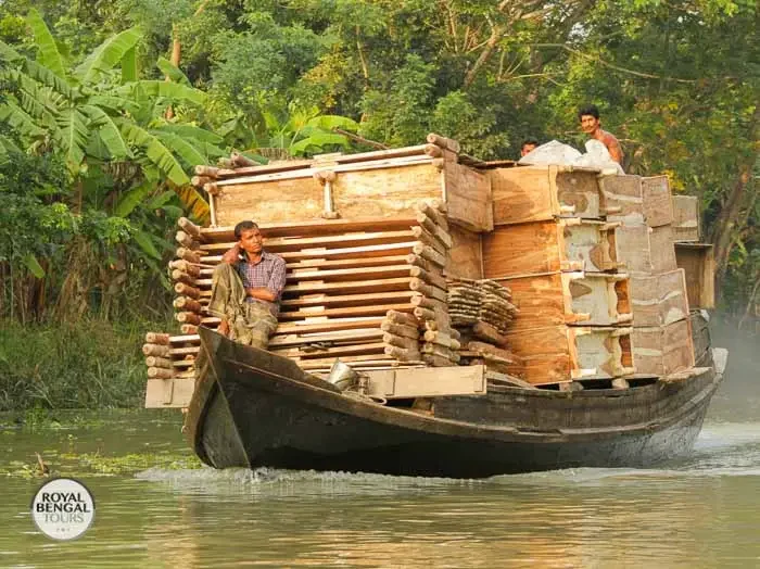 a boat is loaded with huge quantities of furniture