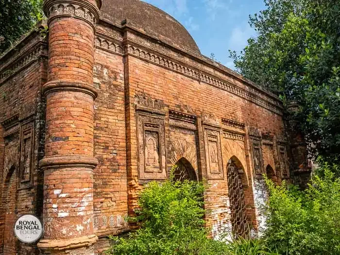 A historic brick mosque showcasing Bengal Sultanate architecture