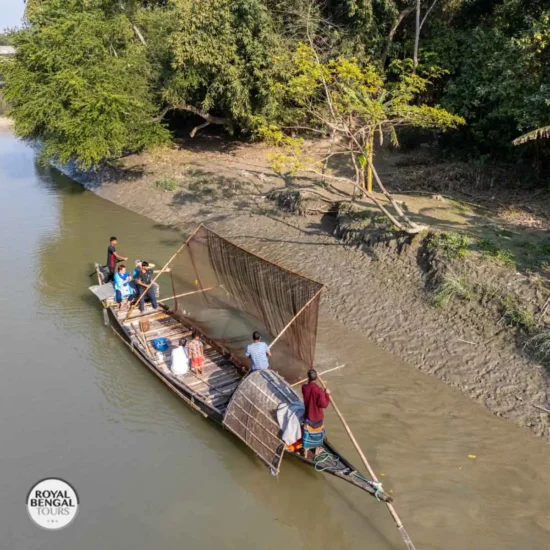 Otter fishermen pulling up the traditional net during fishing